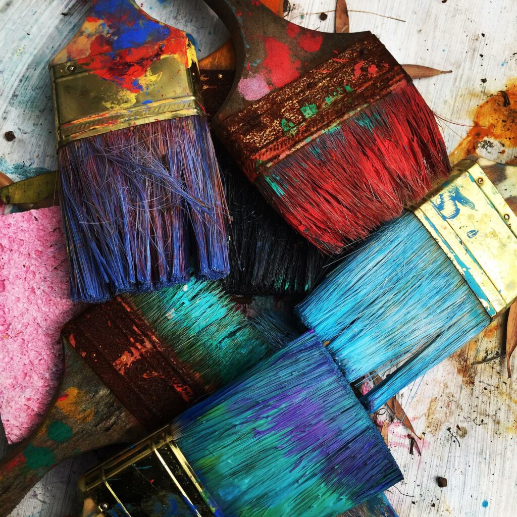 Colorful paint brushes in a pile