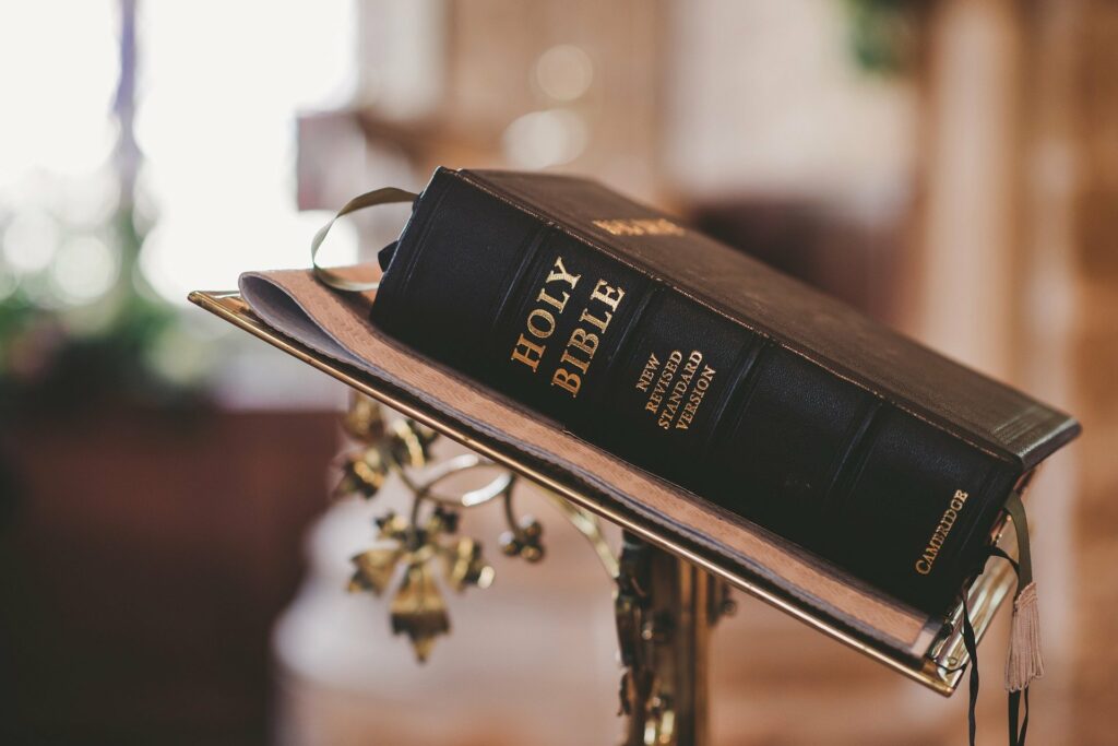 the christian bible on a podium