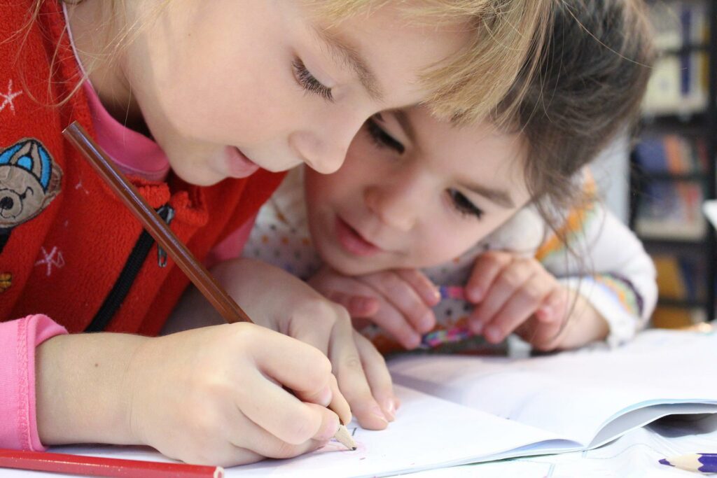 Two kids studying together
